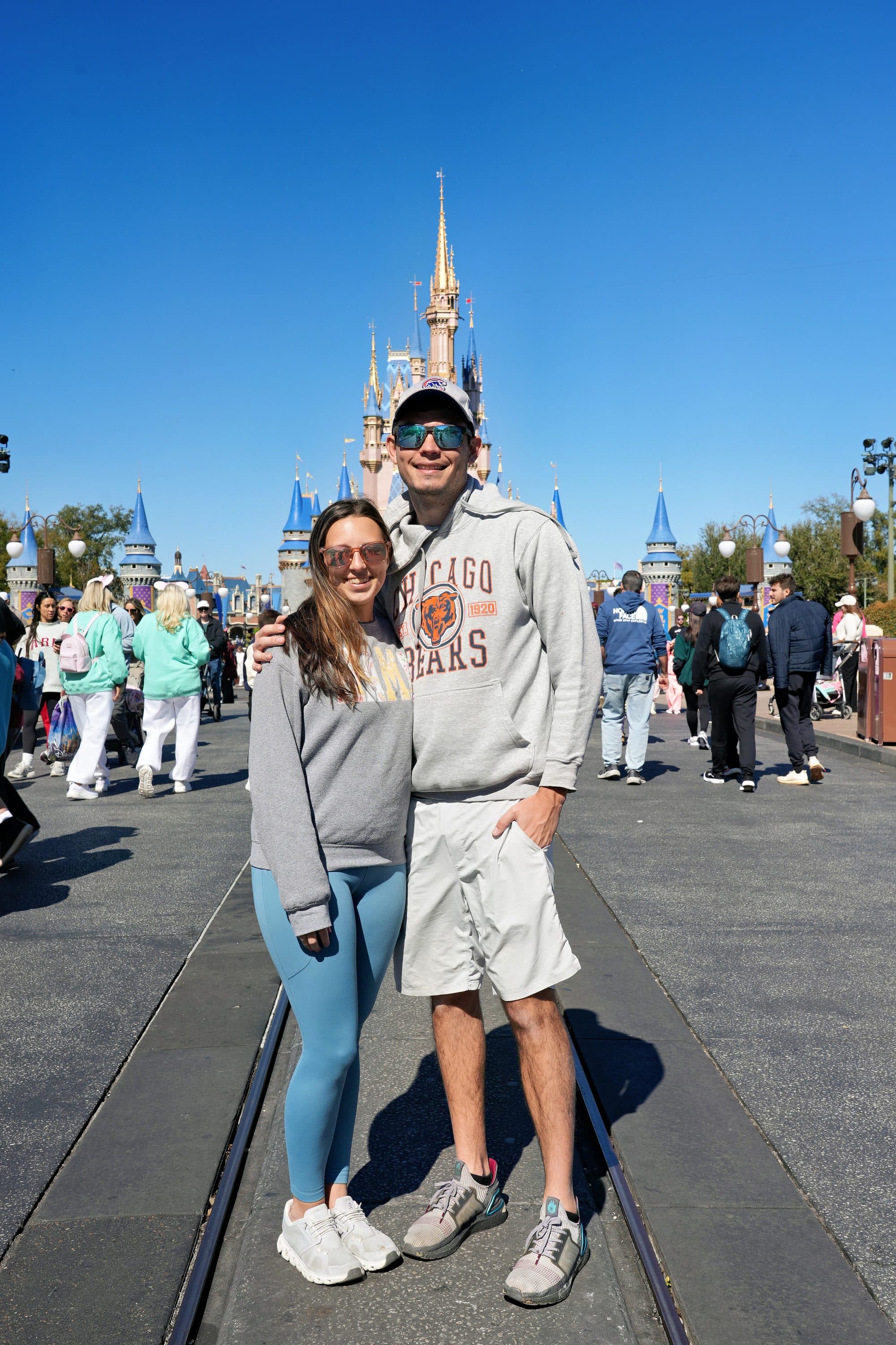 Couple on Main Street with Cinderella Castle behind them